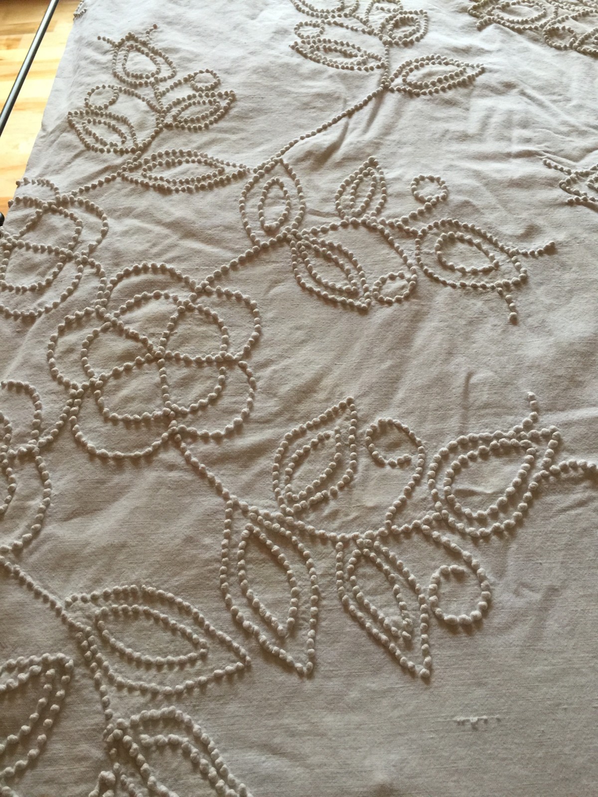 Candlewick coverlet stitched by Anna Maude Bailiff Eggers before her death in 1917 at age 40.